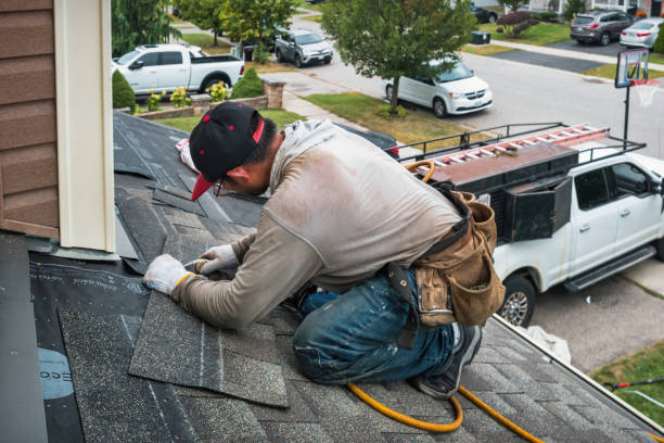 Professional Metal Roofing technician working in Baldwin Place, NY